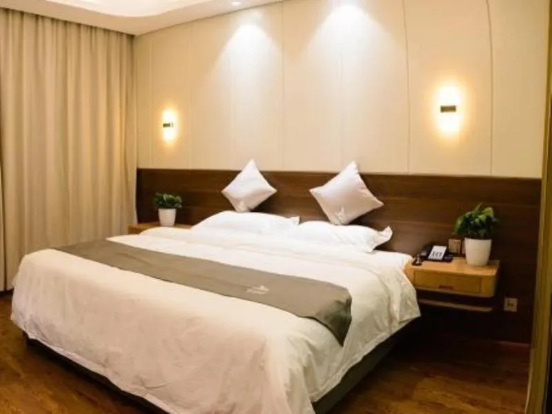 Bed in GreenTree Eastern Rizhao High Speed Railway Station Hotel
