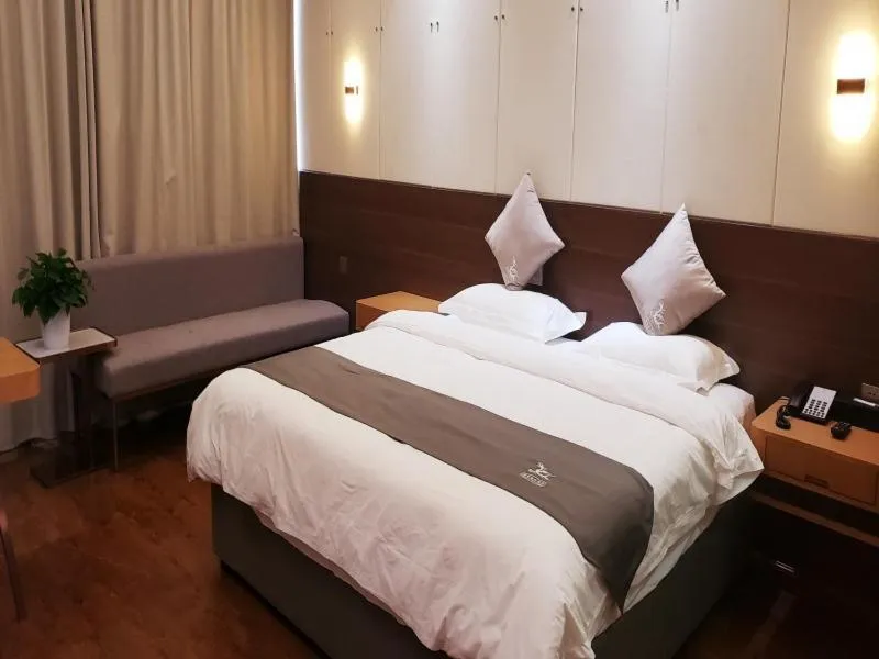Bed in GreenTree Eastern Rizhao High Speed Railway Station Hotel