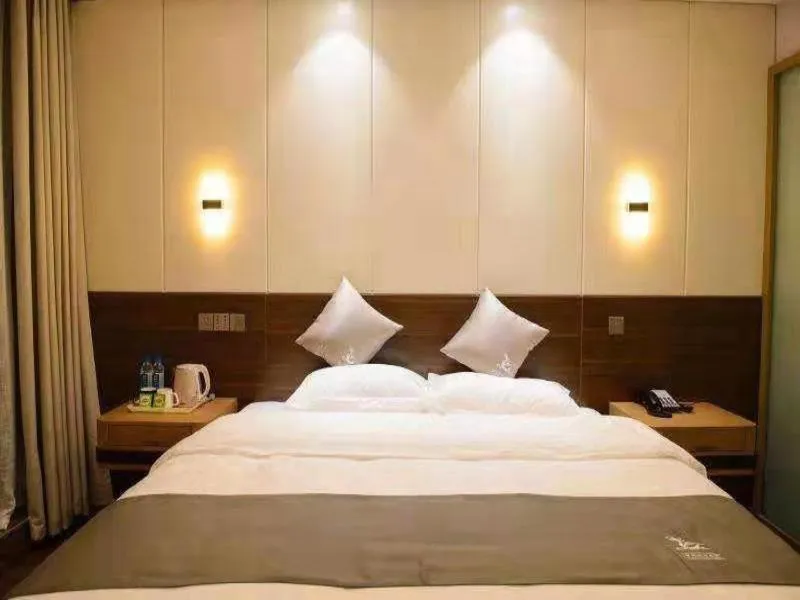 Bed in GreenTree Eastern Rizhao High Speed Railway Station Hotel