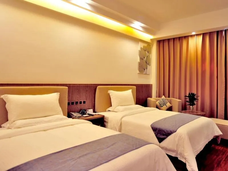 Bed in GreenTree Inn Dongfang City Dongfang Avenue High-speed Railway Station Express Hotel