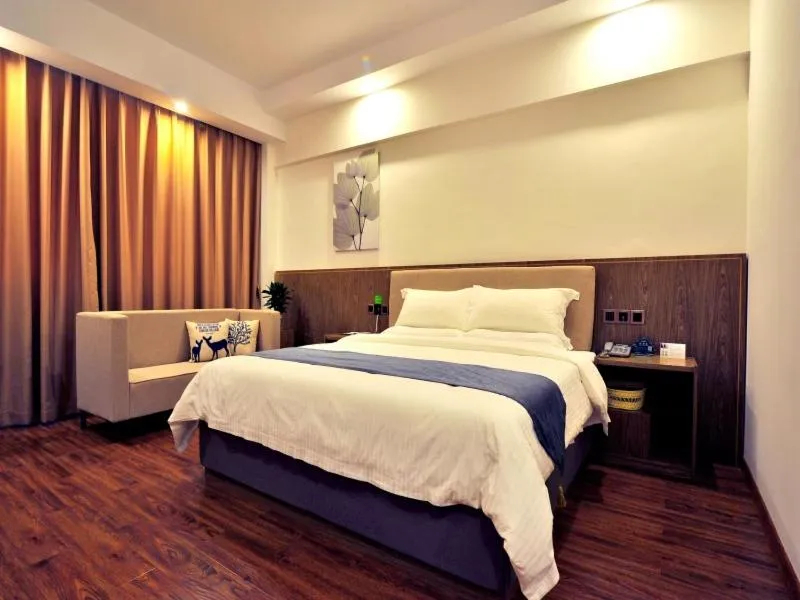 Bed in GreenTree Inn Dongfang City Dongfang Avenue High-speed Railway Station Express Hotel