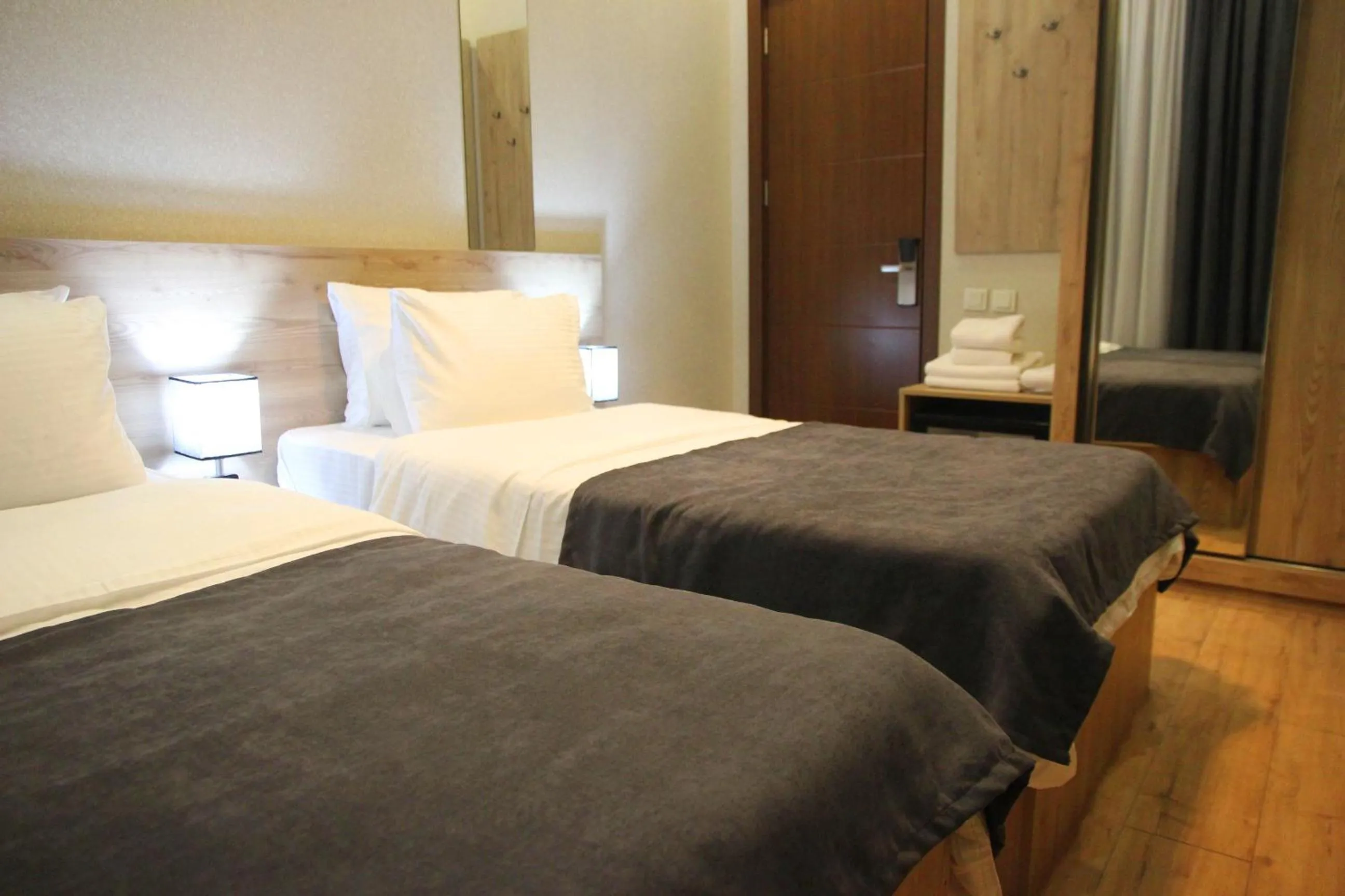 Photo of the whole room, Bed in City Heart Hotel