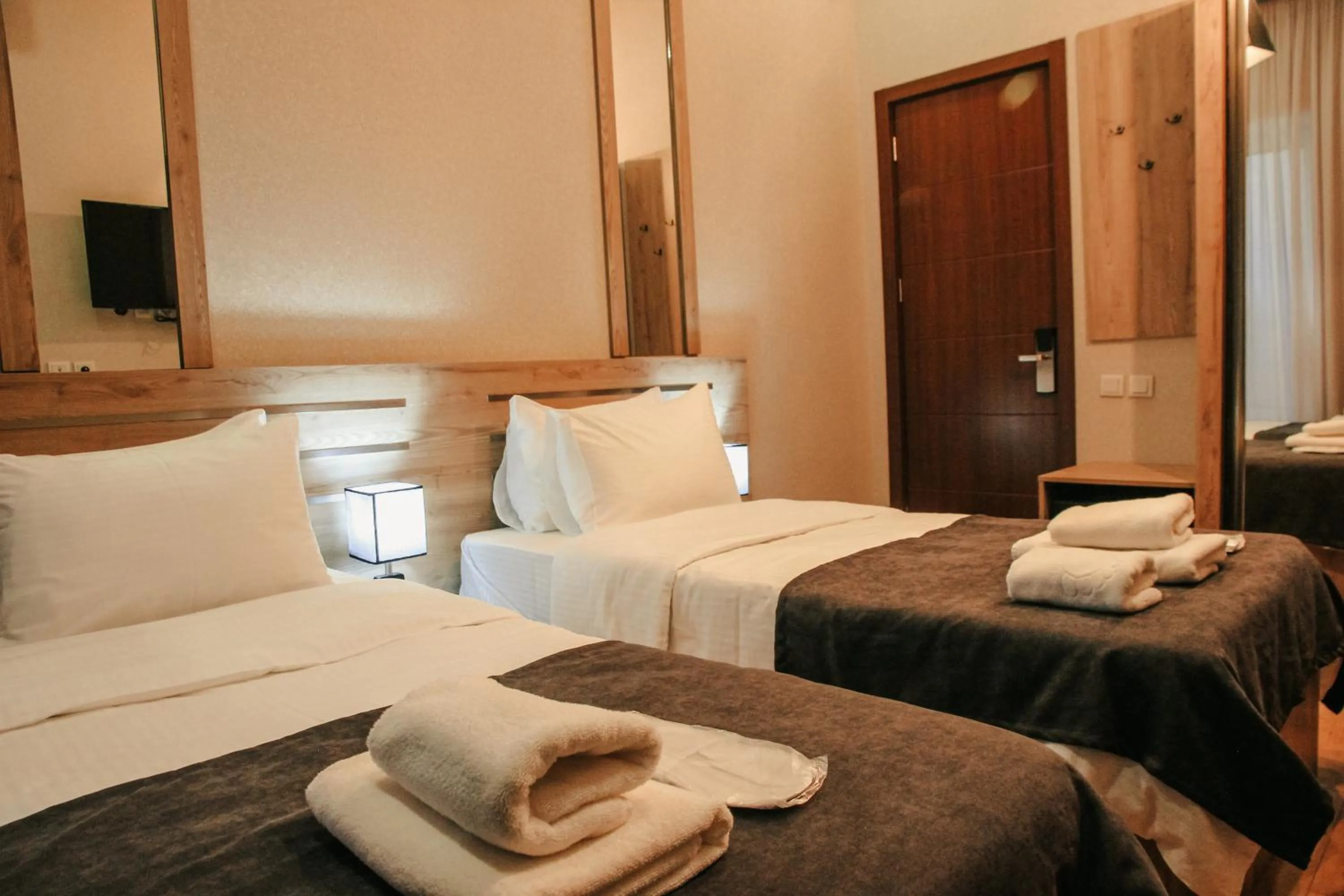 Bed in City Heart Hotel