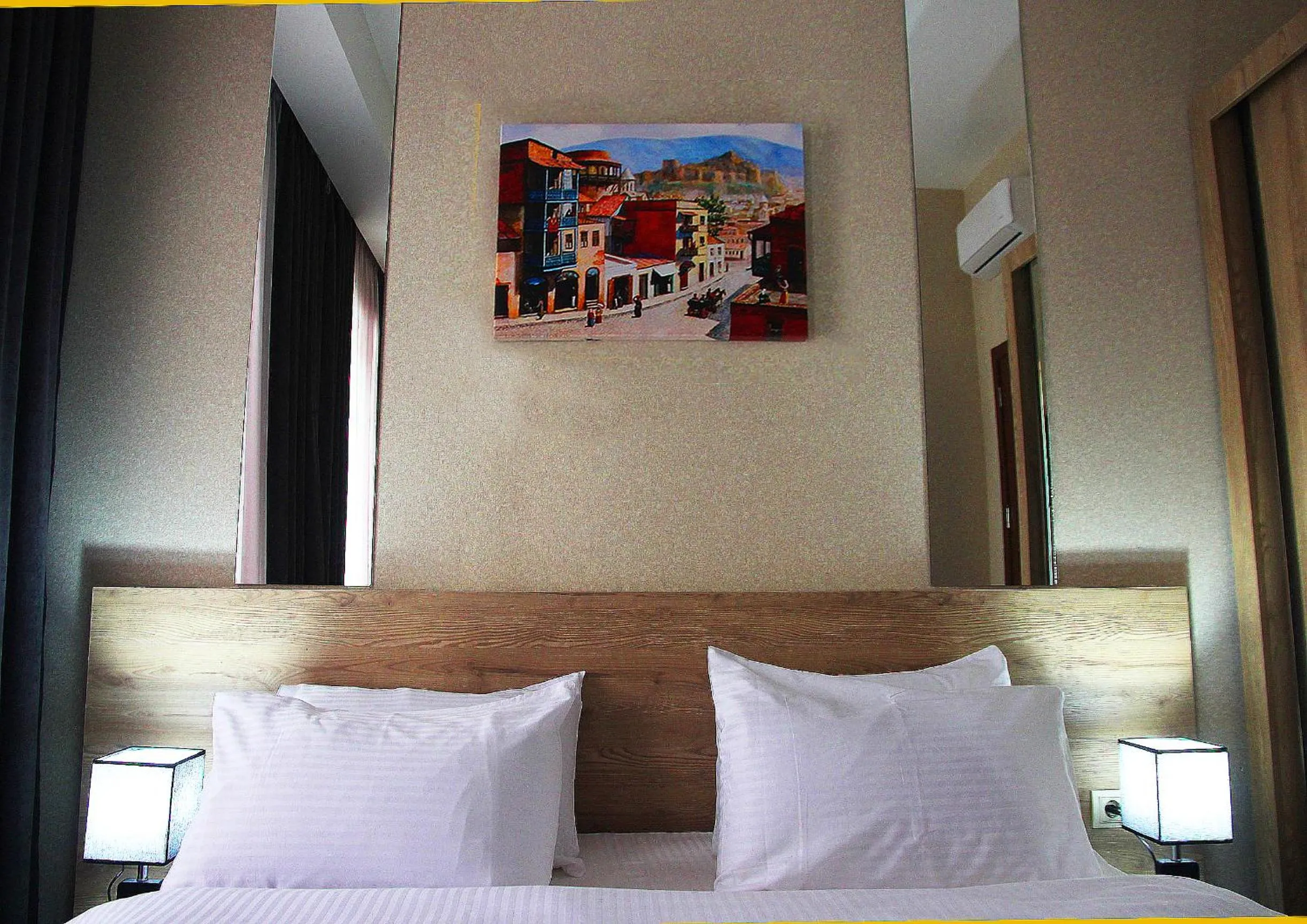 Bed in City Heart Hotel