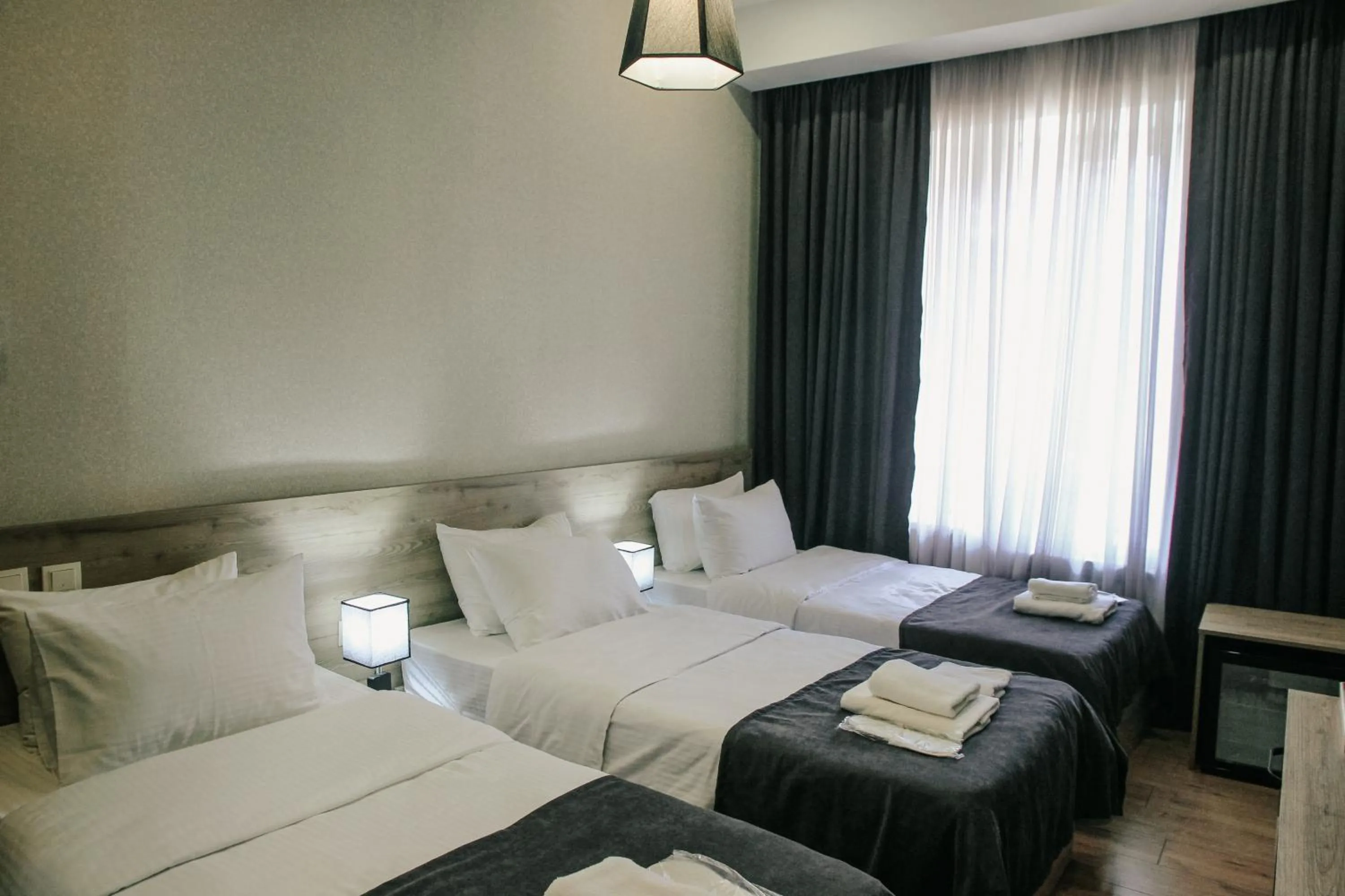 Photo of the whole room, Bed in City Heart Hotel