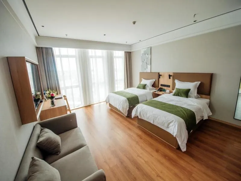 Bed in GreenTree Inn Taizhou Xinghua City Zhouzhuang Town Business Hotel