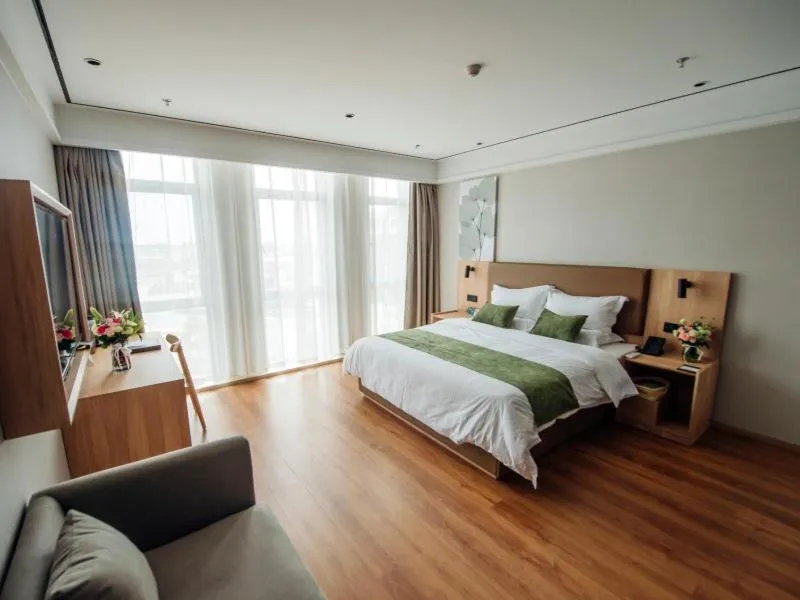 Bed in GreenTree Inn Taizhou Xinghua City Zhouzhuang Town Business Hotel