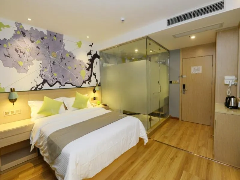 Bed in Vatica Huanggang Luotian County City Square Hotel