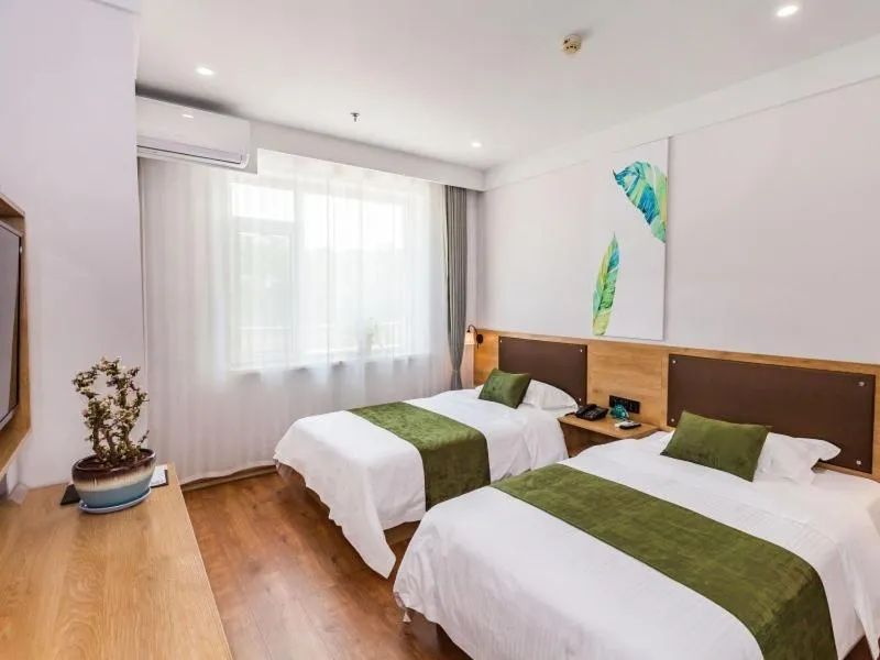 Bed in GreenTree Inn Dalian Airport New District Xinzhaizi Express Hotel