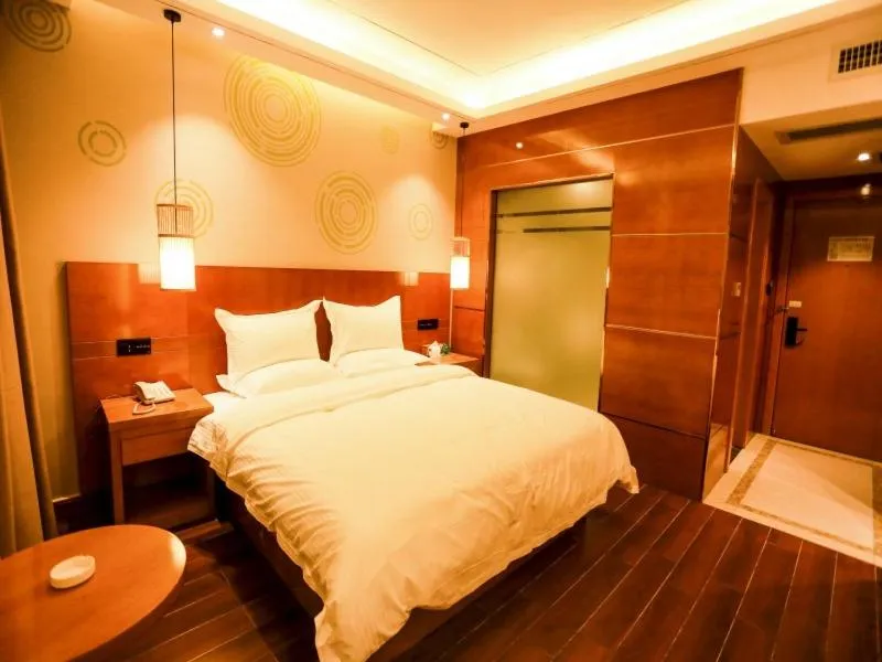 Bed in GreenTree Inn Anshun Guansuo Avenue Hotel