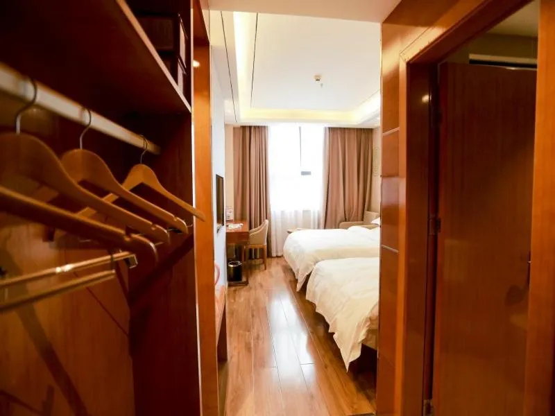 Bed in GreenTree Inn Anshun Guansuo Avenue Hotel