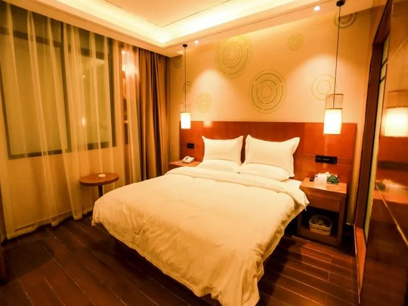 Bed in GreenTree Inn Anshun Guansuo Avenue Hotel