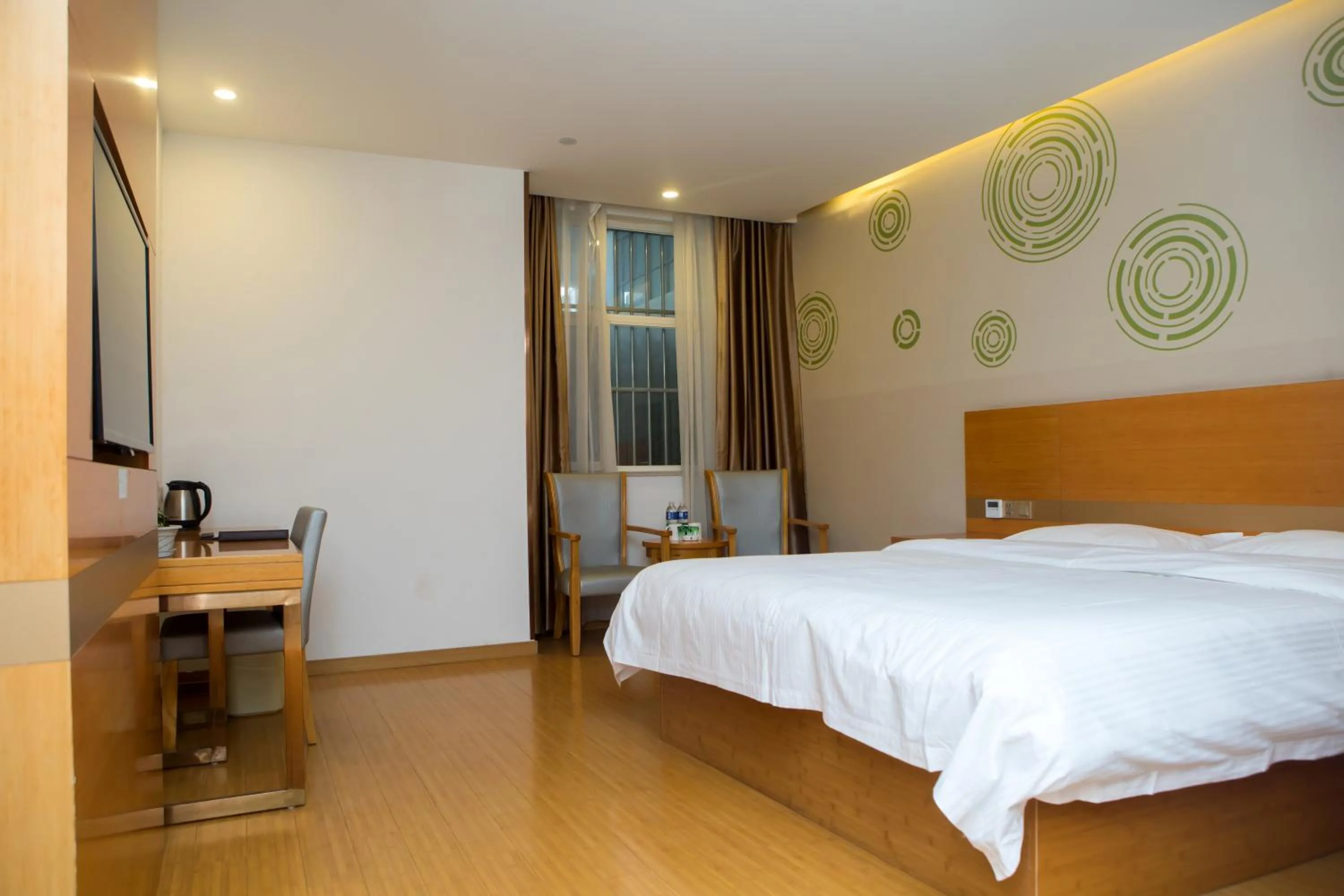 Bed in GreenTree Inn Yangzhou Railway Station Jinzhankou Business Hotel
