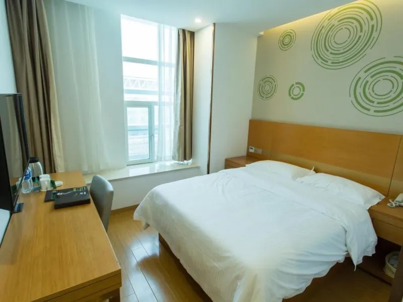Bed in GreenTree Inn Yangzhou Railway Station Jinzhankou Business Hotel