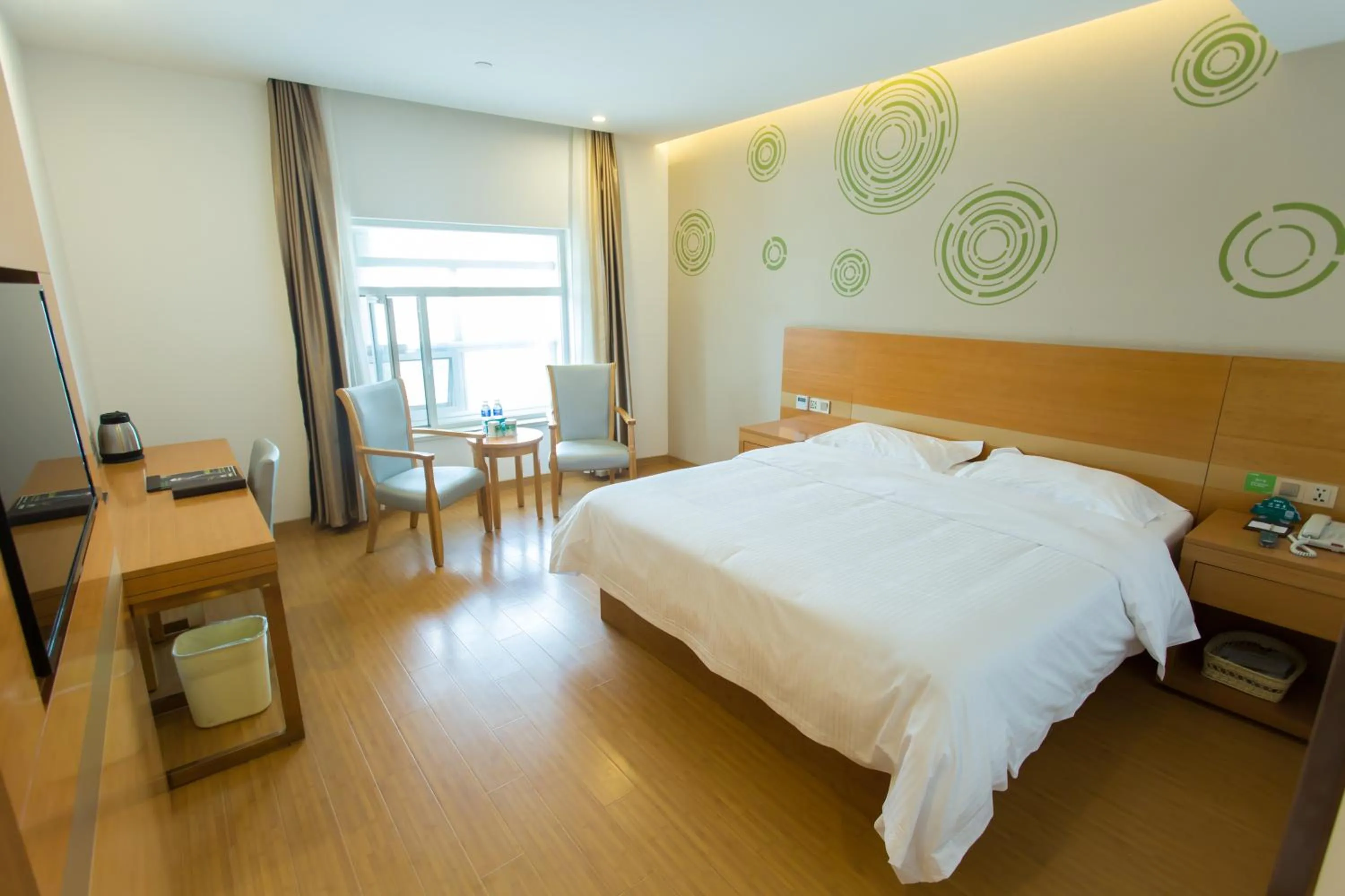 Bed in GreenTree Inn Yangzhou Railway Station Jinzhankou Business Hotel