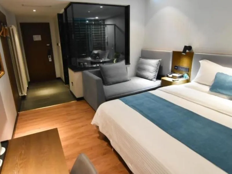 Bed in GreenTree Rizhao Lanshan Coach Station Hotel