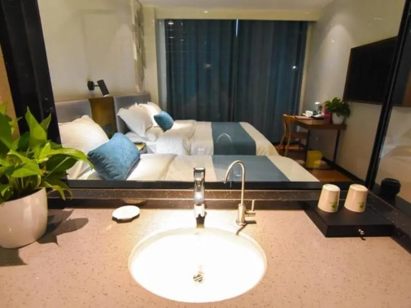 Bed in GreenTree Rizhao Lanshan Coach Station Hotel