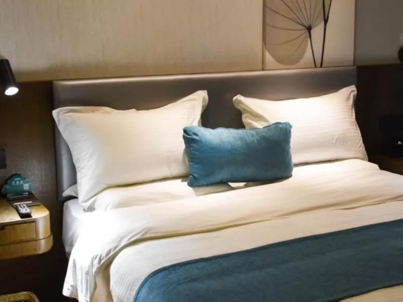 Bed in GreenTree Rizhao Lanshan Coach Station Hotel