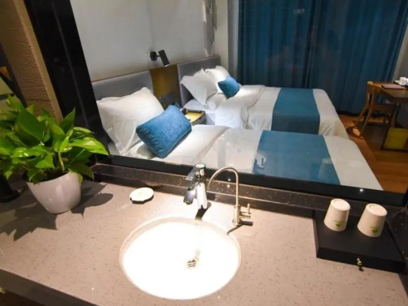 Bed in GreenTree Rizhao Lanshan Coach Station Hotel