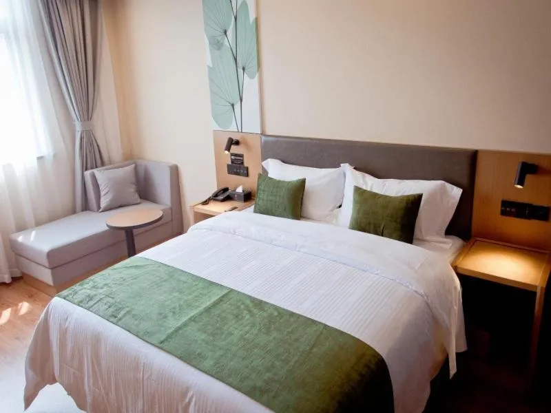 Bed in GreenTree Inn Fuyang City Yingzhou District Kuixing Road Business Hotel