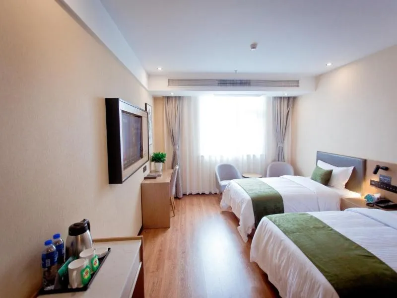 Bed in GreenTree Inn Fuyang City Yingzhou District Kuixing Road Business Hotel