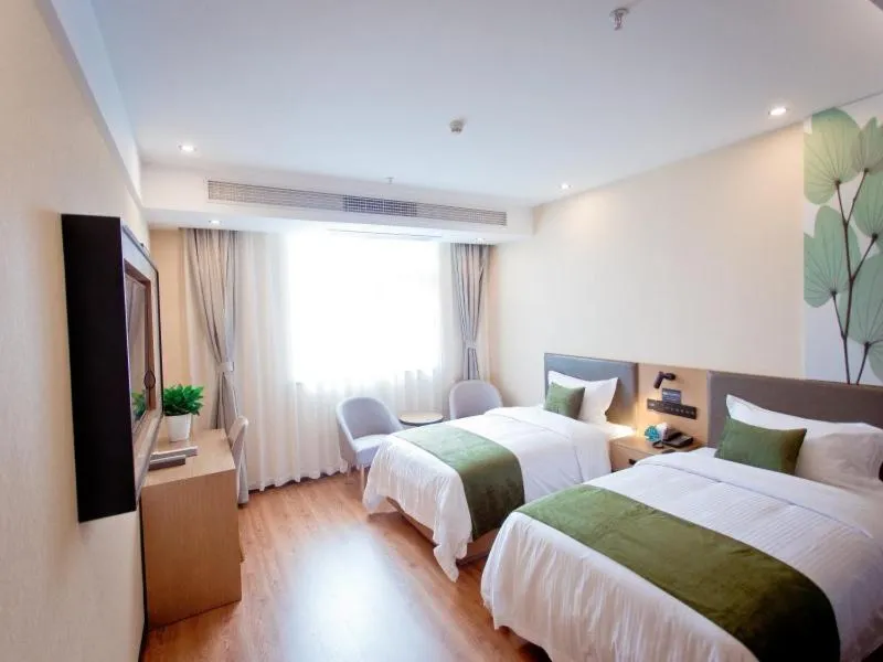 Bed in GreenTree Inn Fuyang City Yingzhou District Kuixing Road Business Hotel