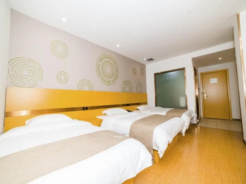 Bed in GreenTree Inn Suzhou Zhangjiagang City Jingang Town Express Hotel