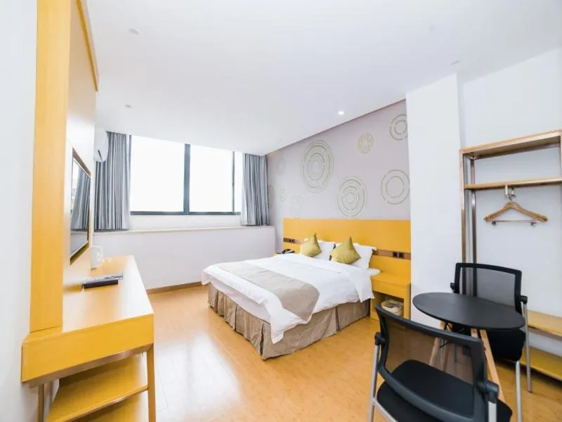 Bed in GreenTree Inn Suzhou Zhangjiagang City Jingang Town Express Hotel