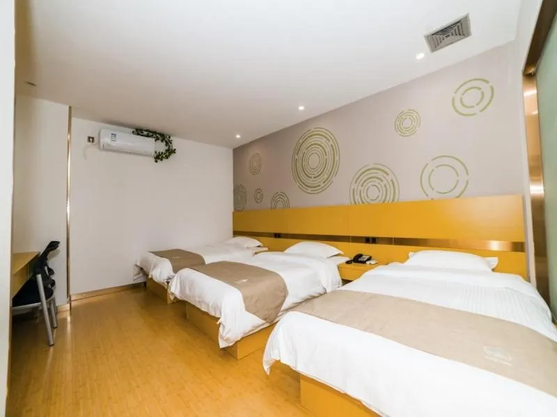 Bed in GreenTree Inn Suzhou Zhangjiagang City Jingang Town Express Hotel