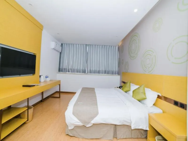 Bed in GreenTree Inn Suzhou Zhangjiagang City Jingang Town Express Hotel