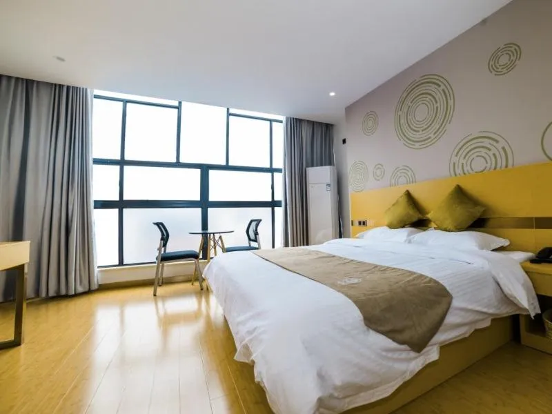 Bed in GreenTree Inn Suzhou Zhangjiagang City Jingang Town Express Hotel