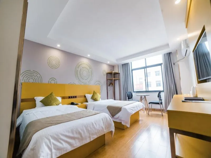 Bed in GreenTree Inn Suzhou Zhangjiagang City Jingang Town Express Hotel