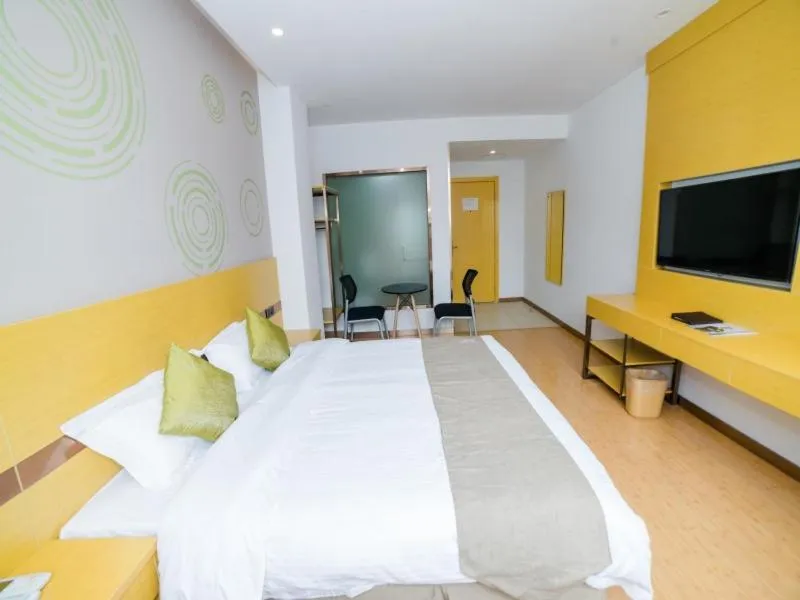 Bed in GreenTree Inn Suzhou Zhangjiagang City Jingang Town Express Hotel