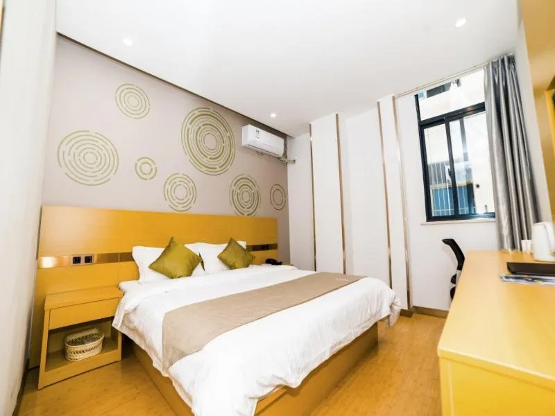 Bed in GreenTree Inn Suzhou Zhangjiagang City Jingang Town Express Hotel