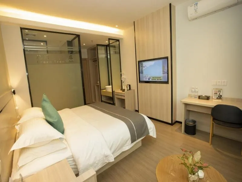 Bed in GreenTree Inn Yulin Exhibition Center Darunfa Hotel