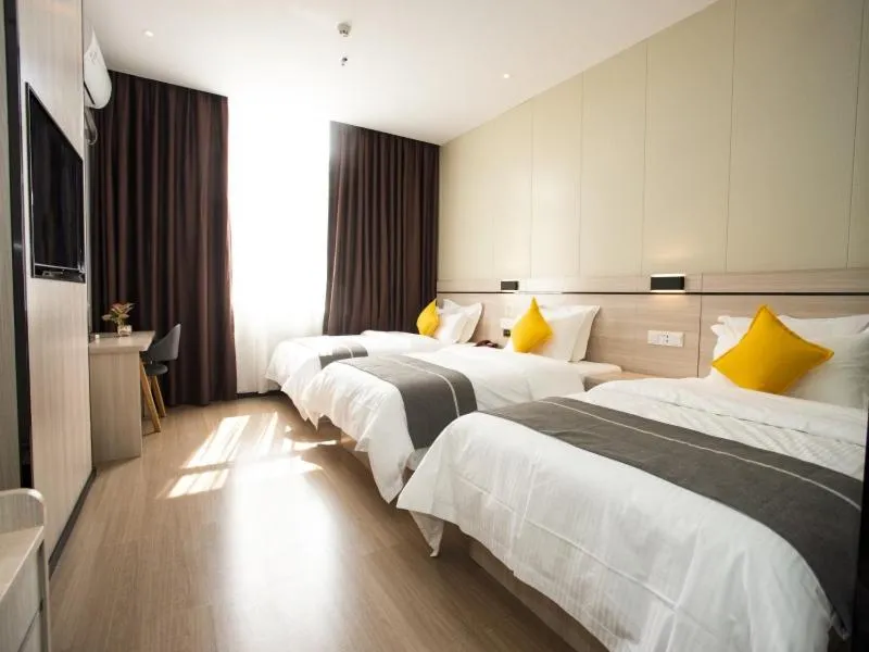 Bed in GreenTree Inn Yulin Exhibition Center Darunfa Hotel