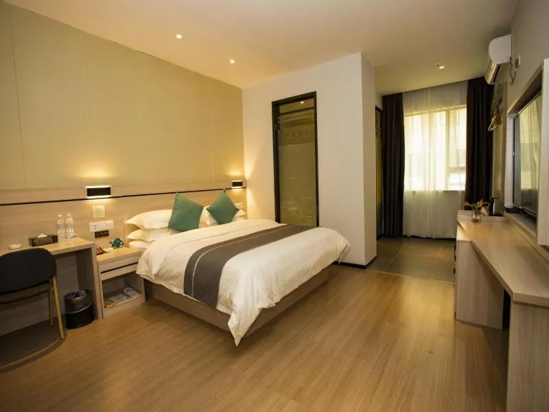 Bed in GreenTree Inn Yulin Exhibition Center Darunfa Hotel