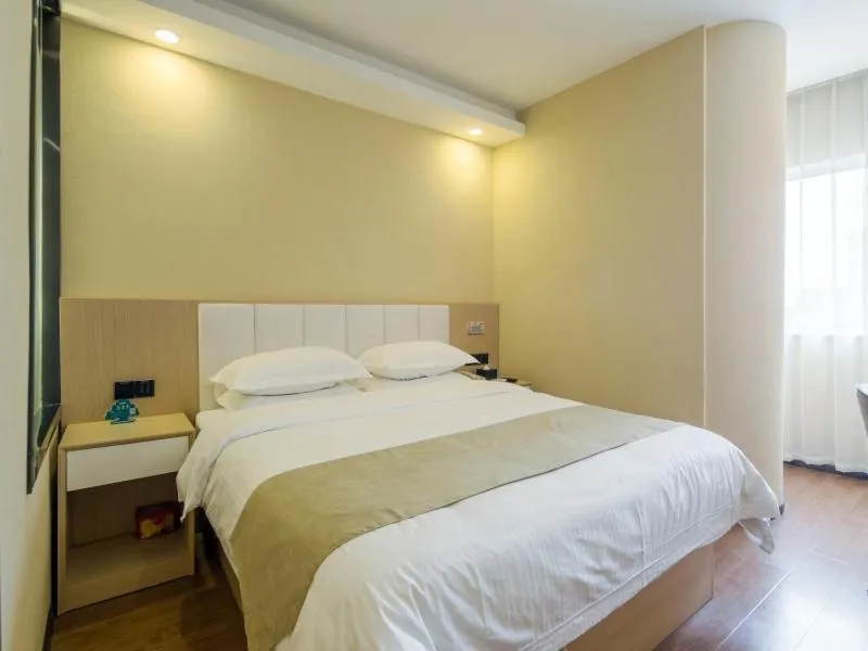 Bed in GreenTree Qindao Chengyang Zhengyang Middle Road Wanda Hotel