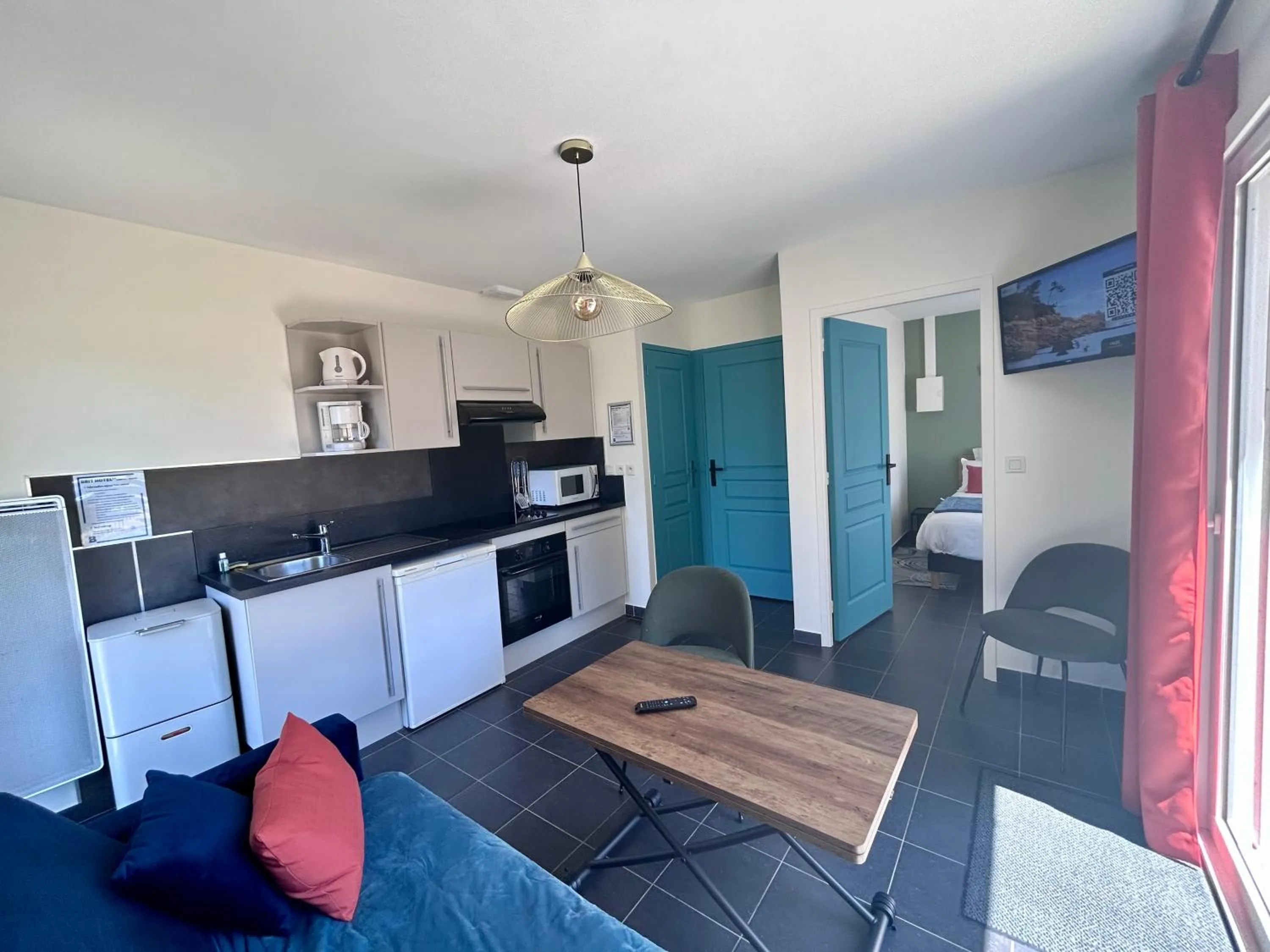 Living room in BRIT HOTEL Lannion-Perros Guirec