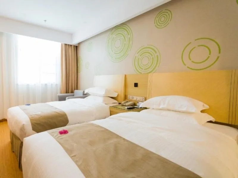 Bed in GreenTree Inn Maanshan East Railway Station Oushang Supermarket Business Hotel