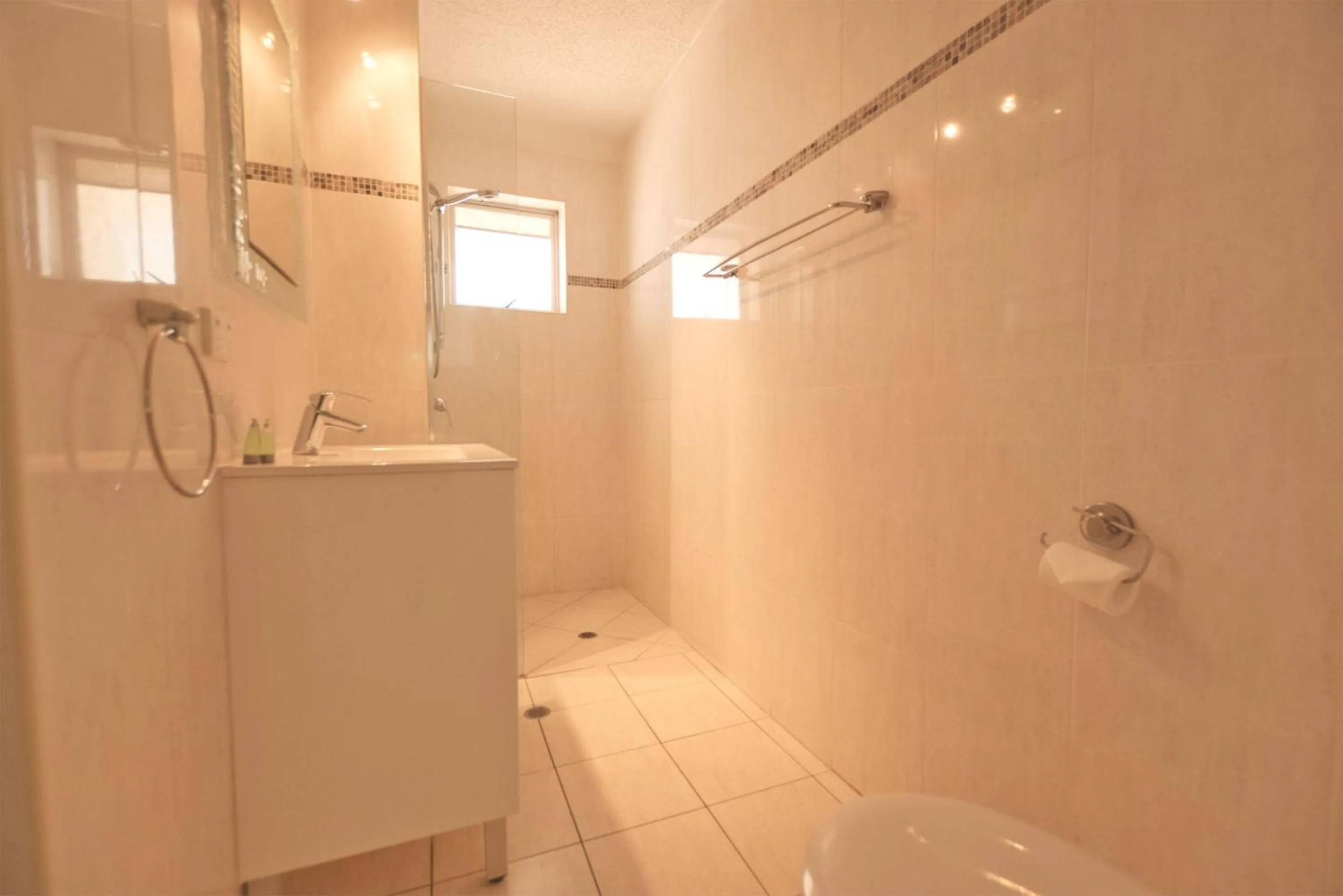 Bathroom in Raintrees Moffat Beach