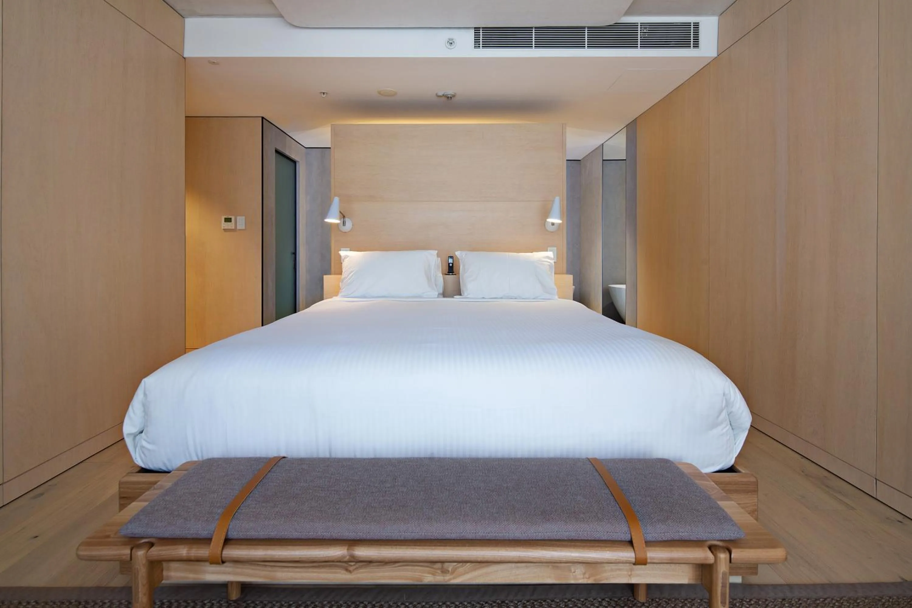 Bed in Zara Tower – Luxury Suites and Apartments