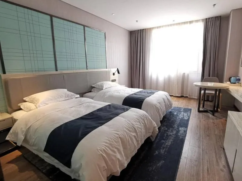 Bed in GreenTree Eastern Lianyungang Jiaruibao Plaza Hotel