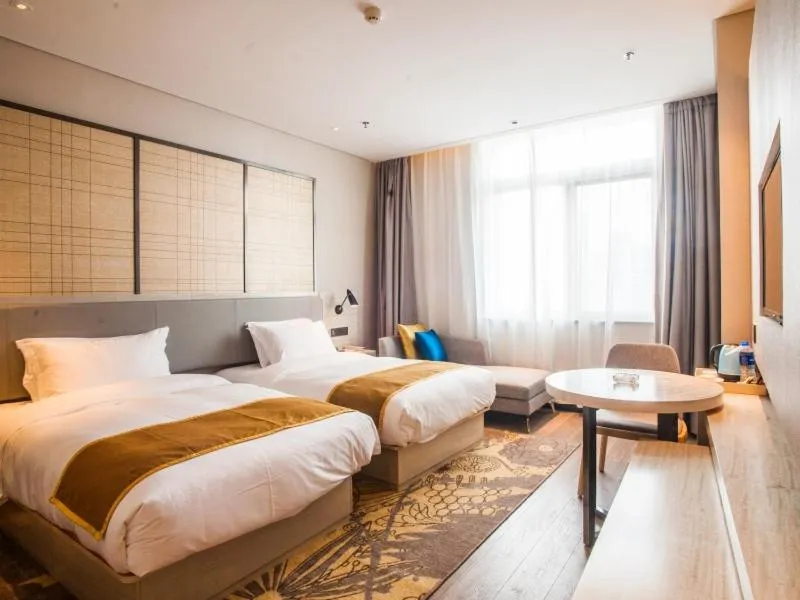 Bed in GreenTree Eastern Lianyungang Jiaruibao Plaza Hotel