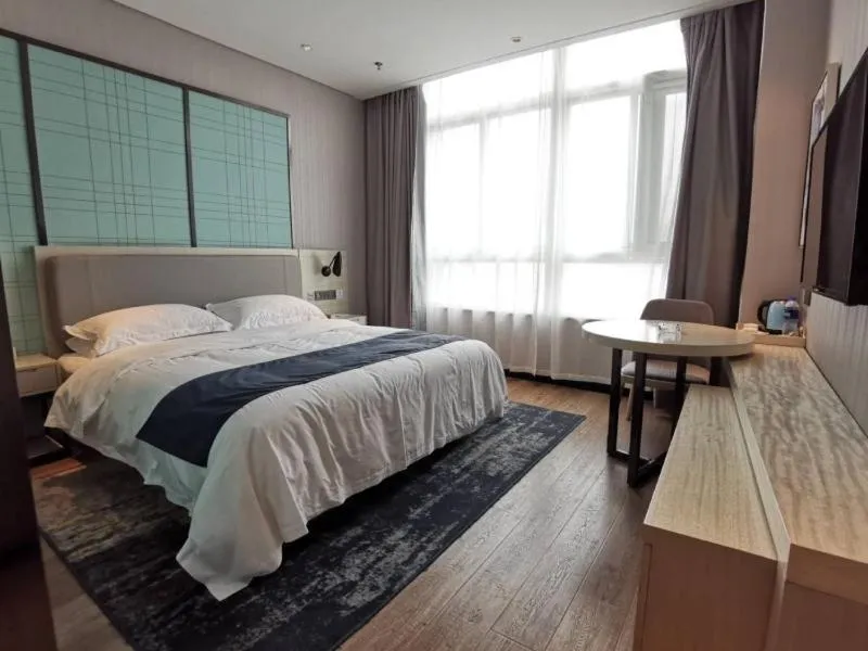 Bed in GreenTree Eastern Lianyungang Jiaruibao Plaza Hotel