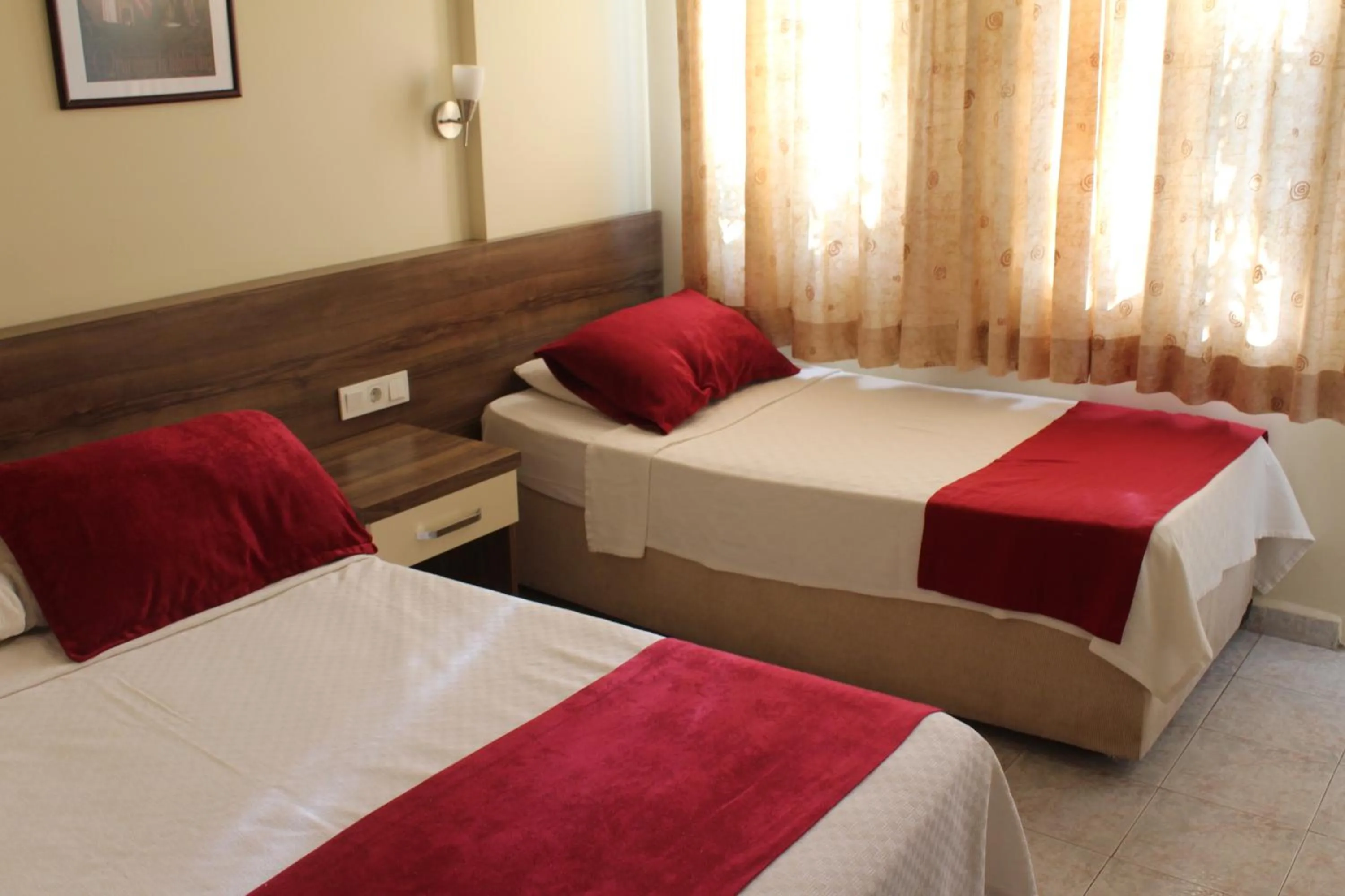 Bed in Dove Apart Hotel