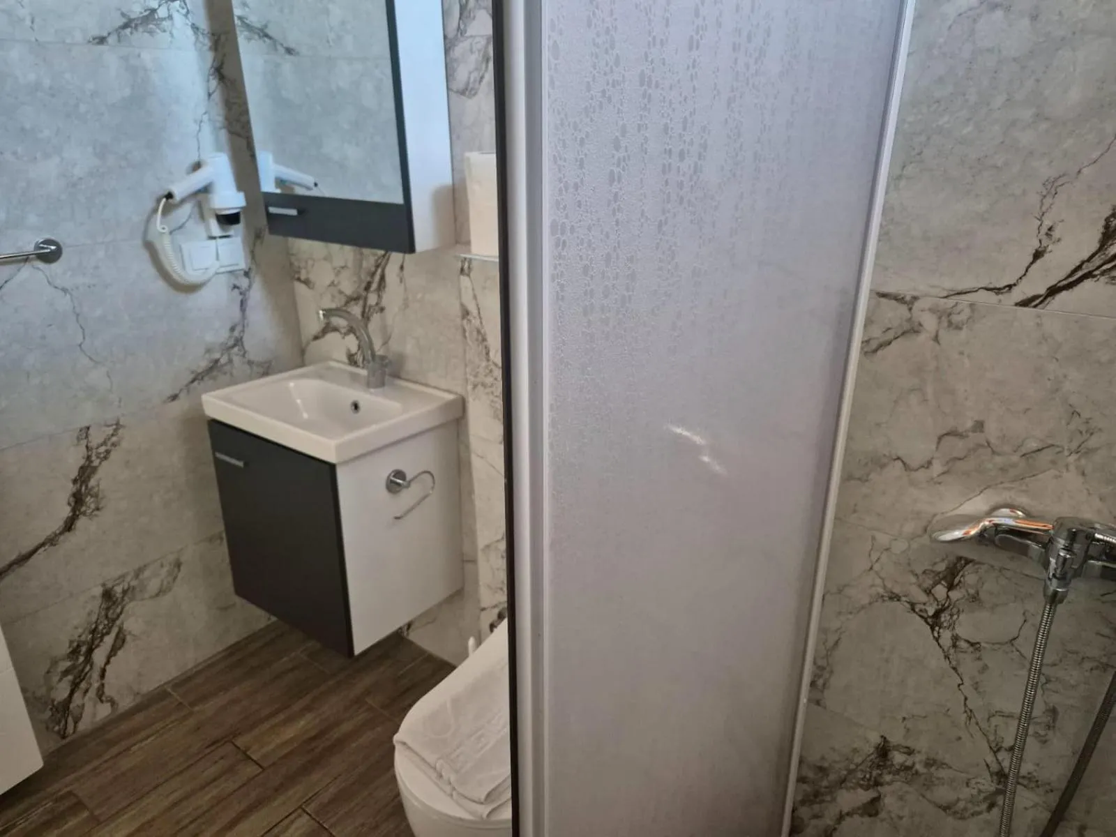 Shower in Dove Apart Hotel