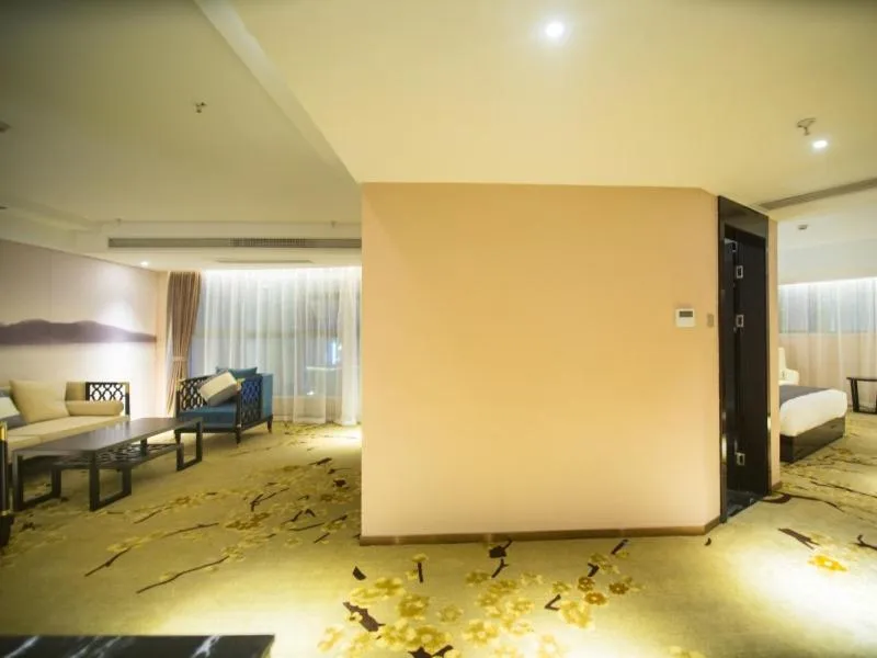 Bed in GreenTree Eastern Jingde Town Railway Station Hotel