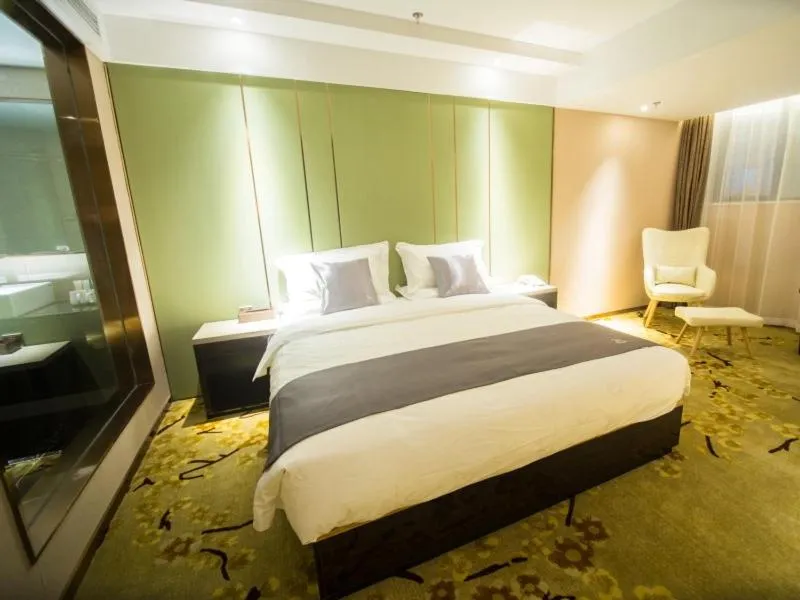 Bed in GreenTree Eastern Jingde Town Railway Station Hotel
