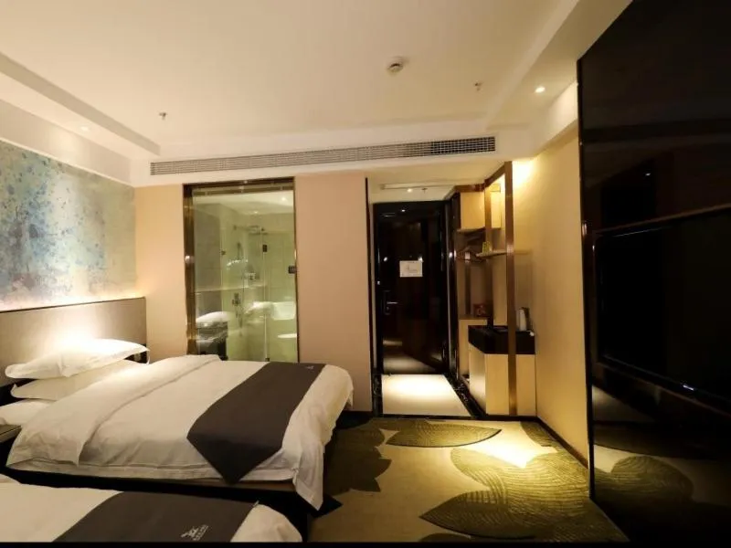 Bed in GreenTree Eastern Jingde Town Railway Station Hotel